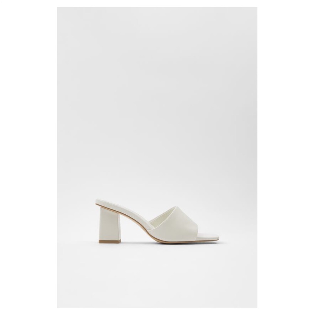 White heels (never worn)